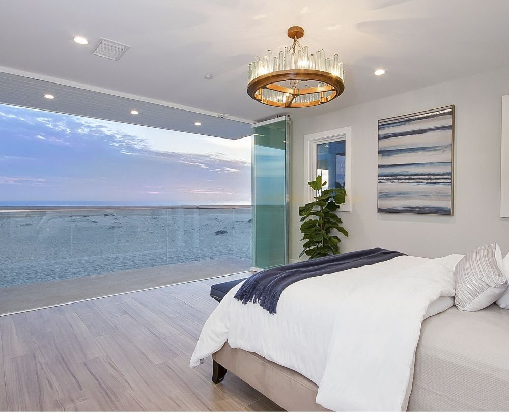 bedroom with beach and ocean view