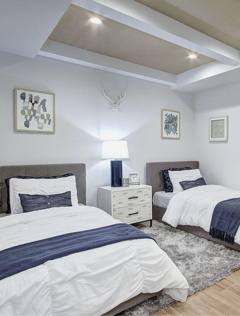 bedroom with dark blue and brown decor