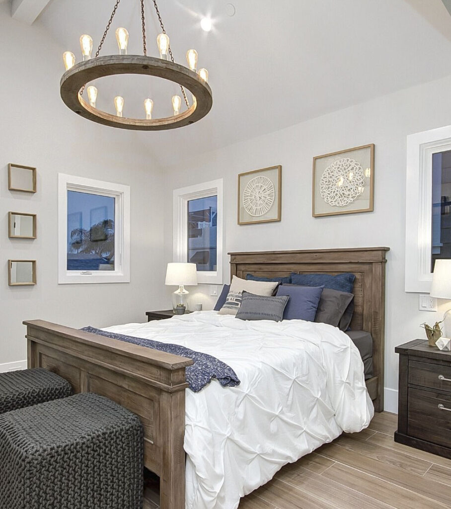 bedroom with farmhouse chandelier