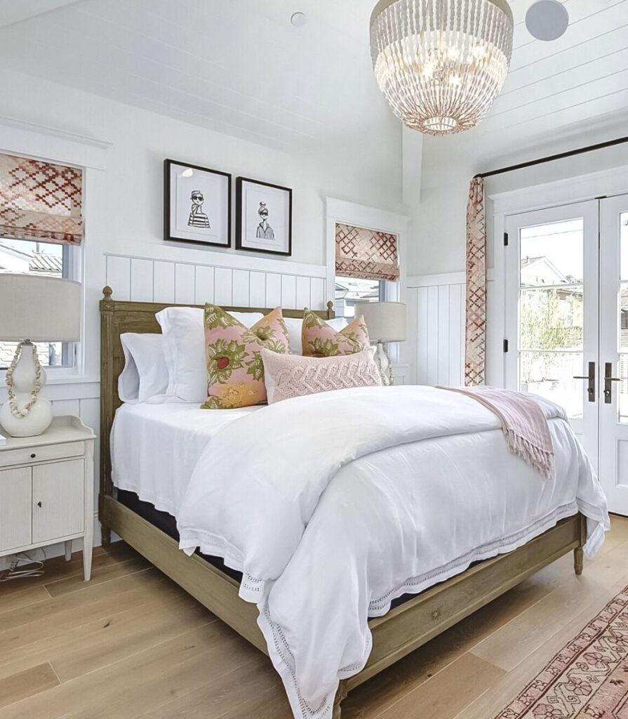 bedroom with vaulted ceiling and pink decor