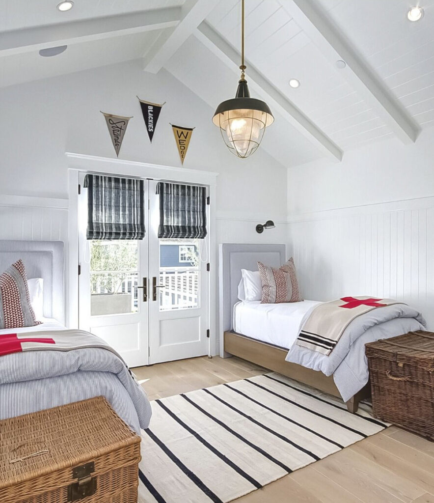 kids bedroom with vaulted ceiling and  striped rug