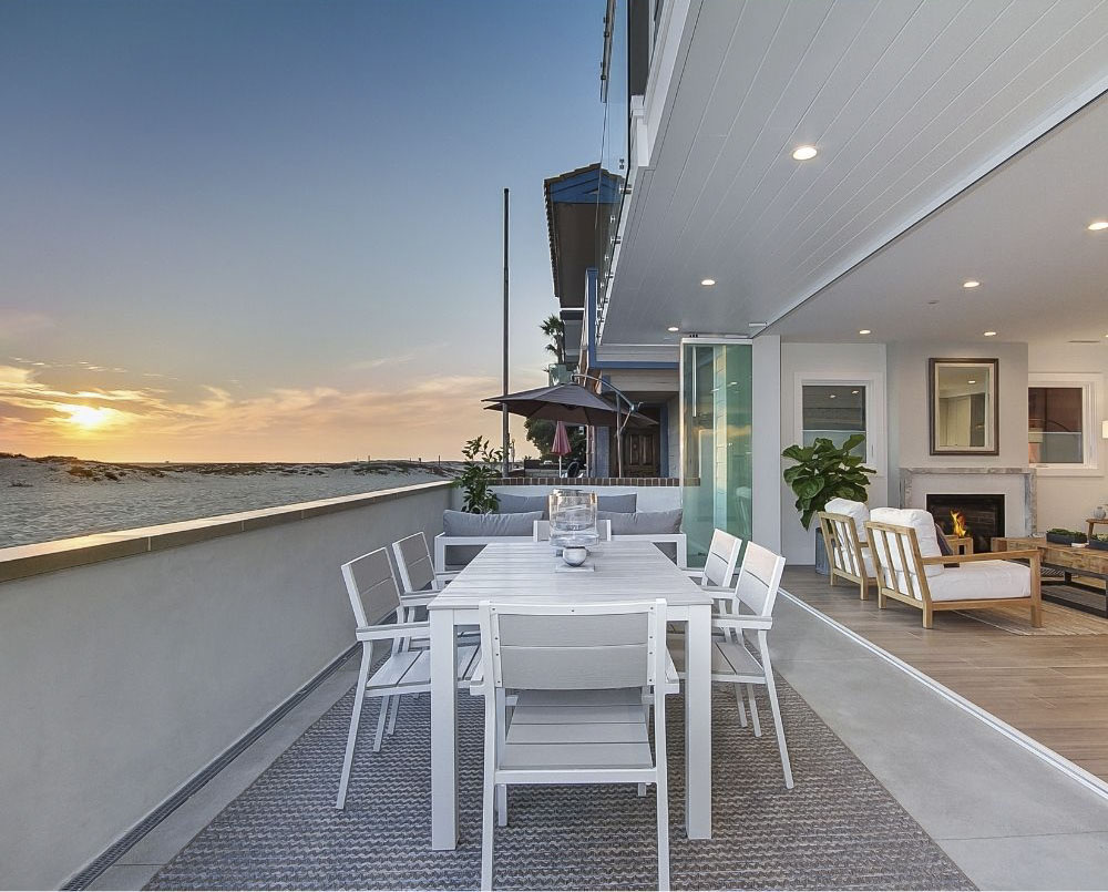 patio with beach view and sunset