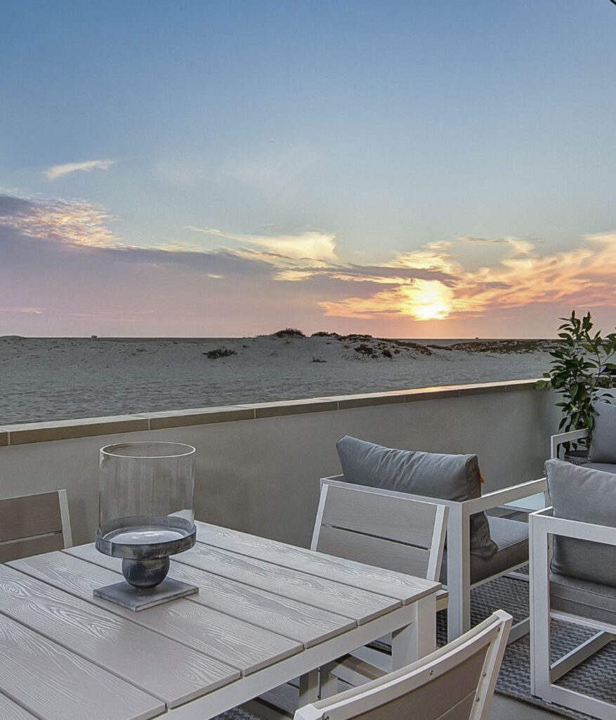 patio with beach view and sunset