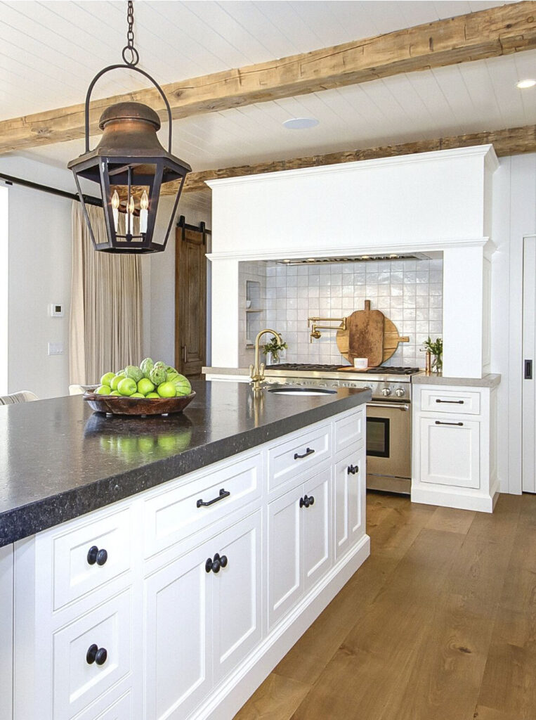 kitchen island with black granite countertop